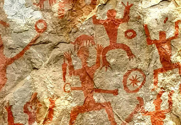 史前的手鼓岩画 - 描绘手持鼓状物的场景，包括竹丁和椰鼓的使用